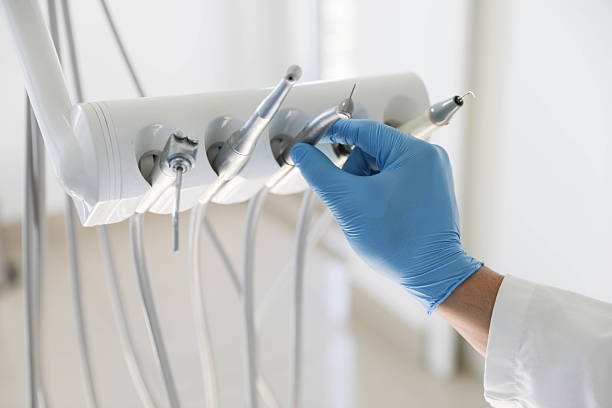 Professional Tooth Extraction technician working in Troutman, NC